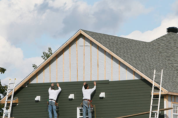 Professional Siding technician working in Portland, IN